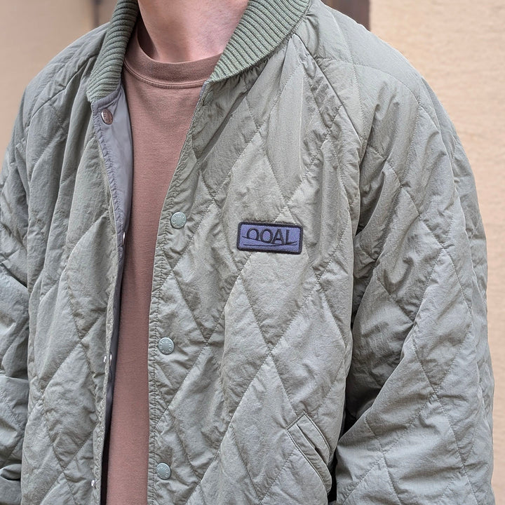 nanamica - OOAL Quilting Varsity Jacket - S26FA026